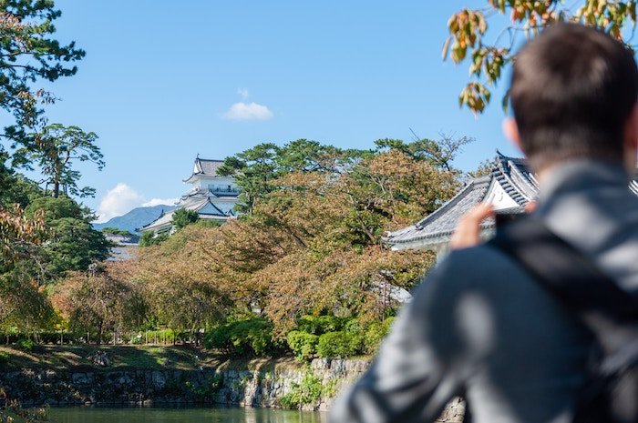 A person Photographing Odawara Castle